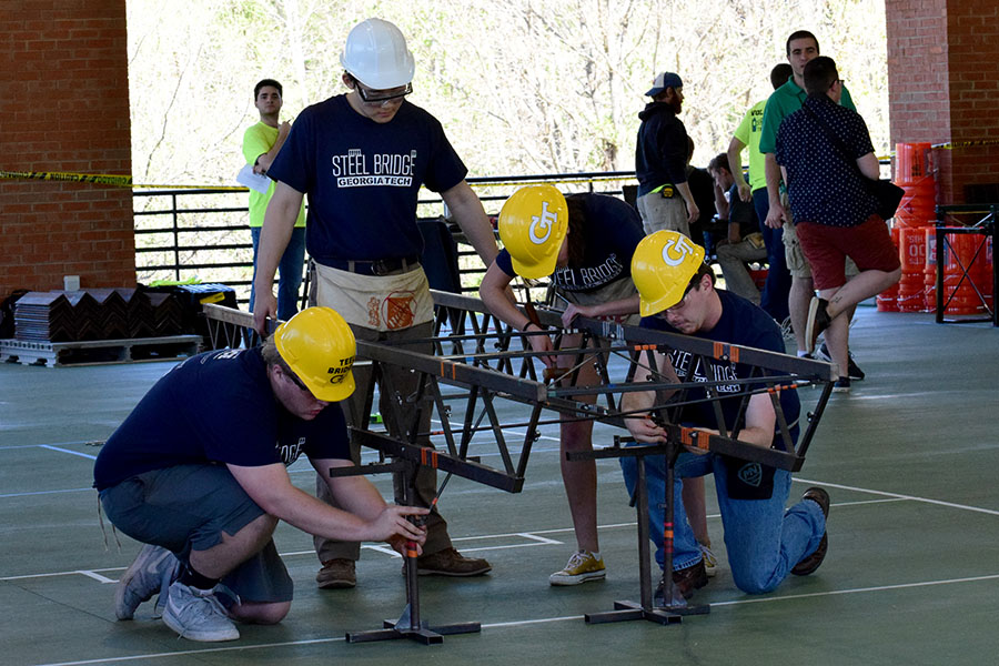 Members of the ASCE steel bridge team put together their design at the Carolinas Regional Conference for student chapters April 1. The team, led by Colin Martin and Mihai Mavrodin, won first place and advance to national competition in May. (Photo: Thomas S. Teichmann)