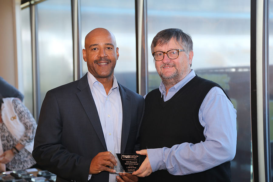 David Frost receives his award from School Chair Reginald DesRoches. (Photo: Jess Hunt-Ralston)