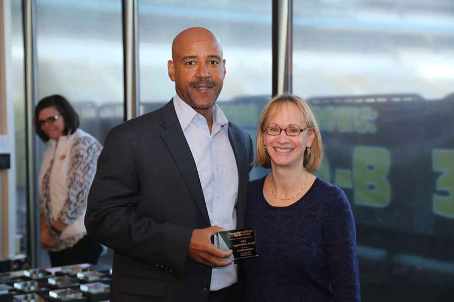 Lisa Rosenstein receives her award from School Chair Reginald DesRoches. (Photo: Jess Hunt-Ralston)