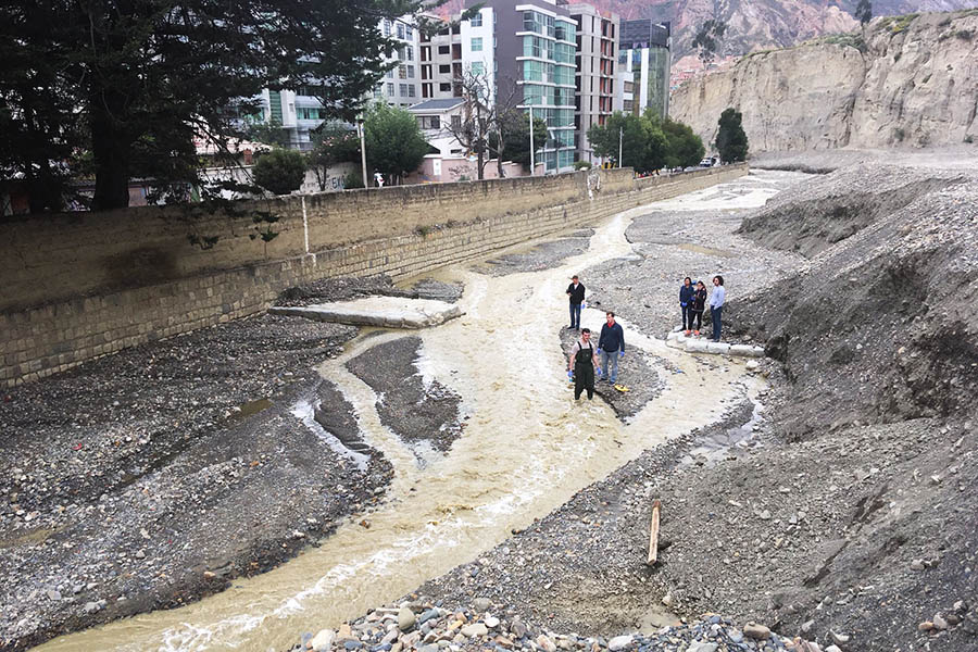 Students in the Environmental Technology in the Developing World course collect water samples from the polluted Choqueyapu River in La Paz during their Spring Break trip to Bolivia. They were researching bioaerosols and using spatial mapping to quantify urban sanitation problems in the city. (Photo: Joe Brown)