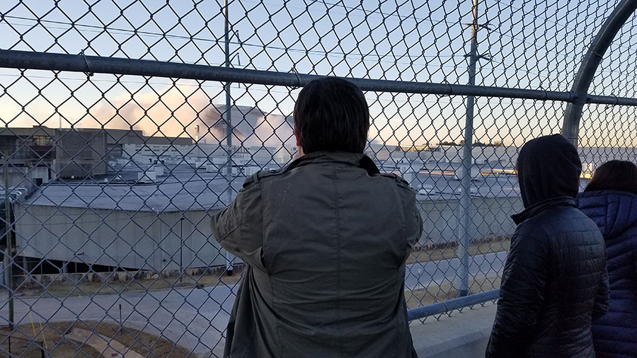 David Frost and some of the students in his Infrastructure Design Analysis course look at the dust cloud after the Georgia Dome implosion Nov. 20. (Photo: Joshua Stewart)