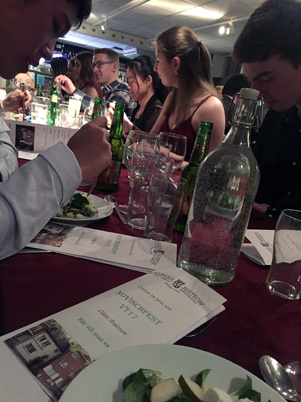A Swedish "sittning" — a formal dinner where friends gather to eat and sing. These dinners were one of the cultural traditions in Sweden that demonstrated the country's commitment to balance to junior Claire Anderson.