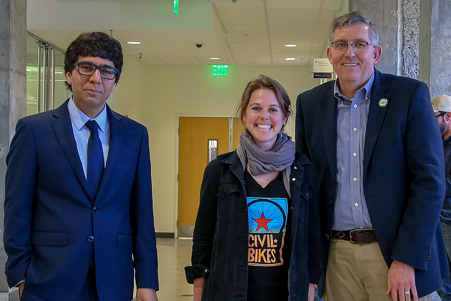 Anna Nord, center, receives her award from awards committee chair Arash Yavari, left, and School Chair Donald Webster.  (Photo: Amelia Neumeister)