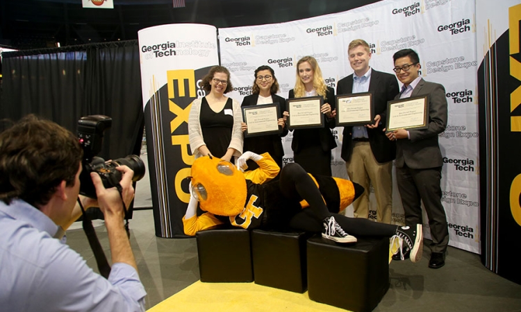 The winning CEE team at the spring 2016 Capston Design Expo pictured with Assistant Professor Kari Watkins, left: Lilian Ayala, Sage Roberts, John Bolen and Ryan Liu.