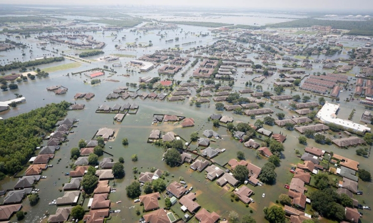 Floodwaters cover Port Arthur, Texas, on August 31, 2017, following Hurricane Harvey. Staff Sgt. Daniel J. Martinez took this photo from a South Carolina Helicopter Aquatic Rescue Team UH-60 Black Hawk helicopter during rescue operations following the storm. (Photo: Staff Sgt. Daniel J. Martinez, U.S. Air National Guard)