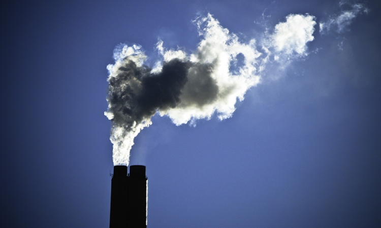 Power plant smoke stacks. A new study led by Tellepsen Chair Armistead "Ted" Russell found that power plant and motor vehicle pollution regulations resulted in better air quality and fewer emergency hospital visits for Atlanta area residents for respiratory problems. (Photo Courtesy: Nick Humphries via Flickr.)