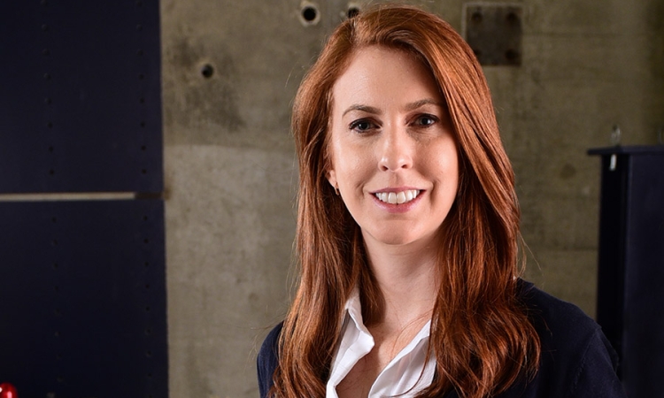 Assistant Professor Lauren Stewart in the Structural Engineering and Materials Lab. (Photo: Gary Meek)