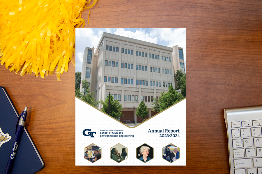 CEE 2023-2024 Annual Report displayed on a desktop with a keyboard.