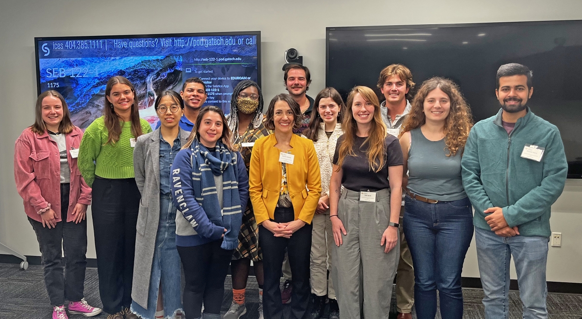 Photo of Dr. Gretchen Goldman with graduate students after lunch