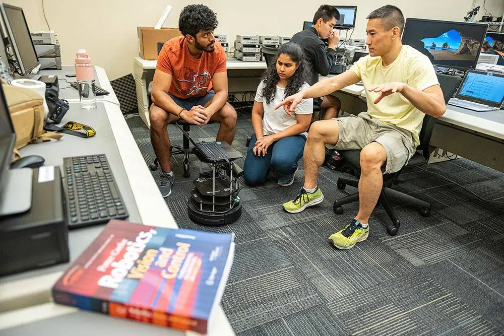 Students working together in a computer lab