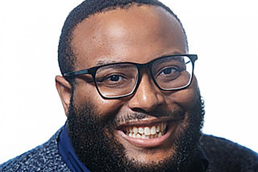 A closely cropped headshot of Andrew White