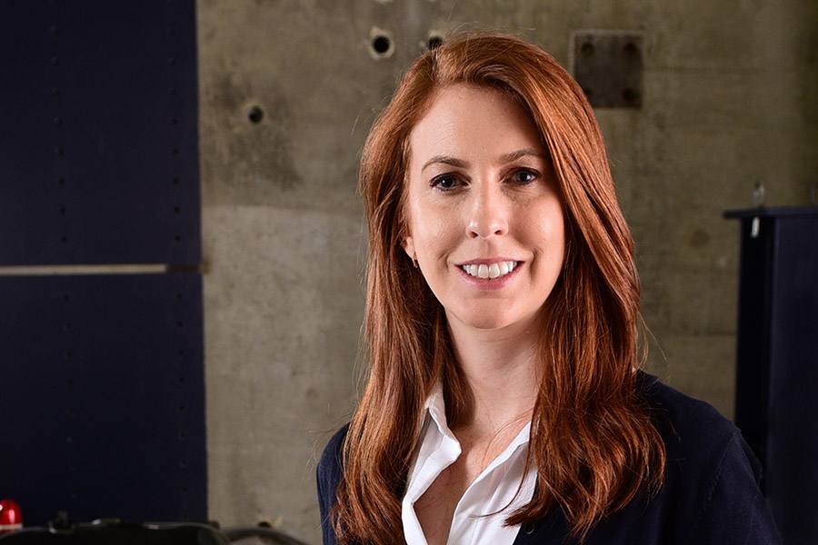 Assistant Professor Lauren Stewart in the Structural Engineering and Materials Lab. (Photo: Gary Meek)